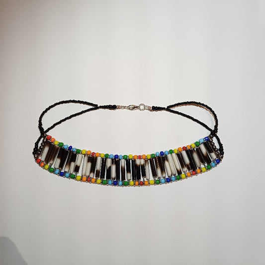 Handcrafted porcupine quill necklace with rainbow and black beads - front view