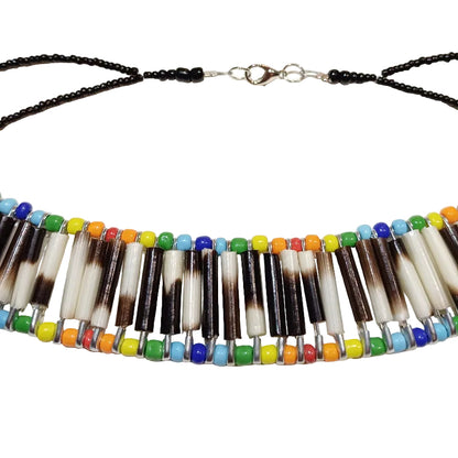 Rainbow beaded porcupine quill necklace detail showing natural quill patterns
