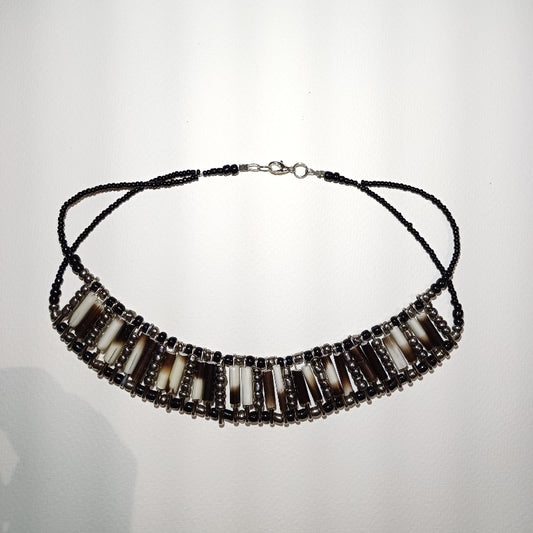 Elegant porcupine quill necklace with silver and black beads - front view