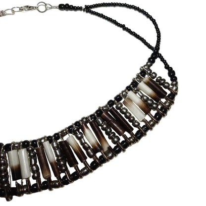 Silver beaded porcupine quill necklace detail showing natural quill craftsmanship